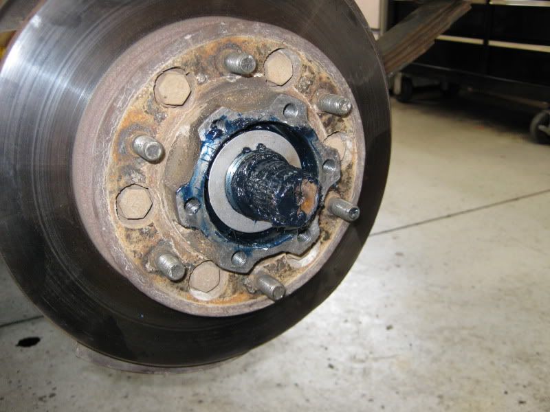 How to tighten nissan patrol wheel bearings